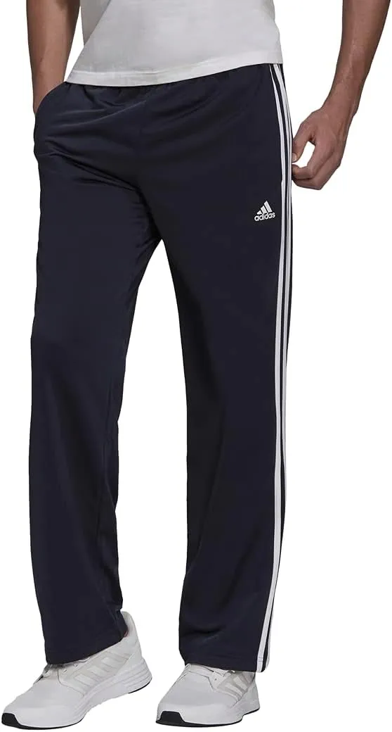 adidas Pantalones de chándal Essentials Warm-up con dobladillo abierto de 3 rayas ...